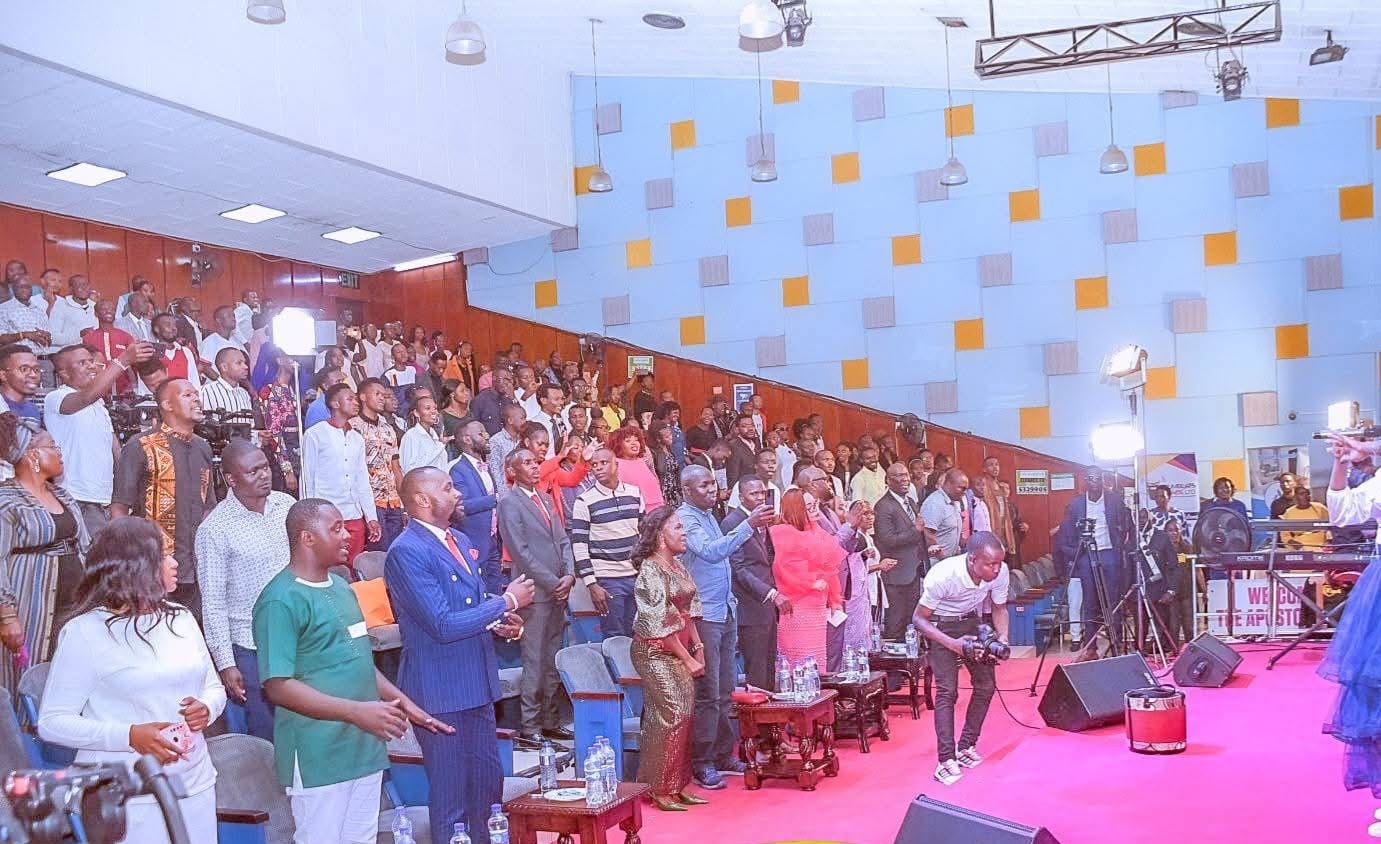 Congregation standing in worship